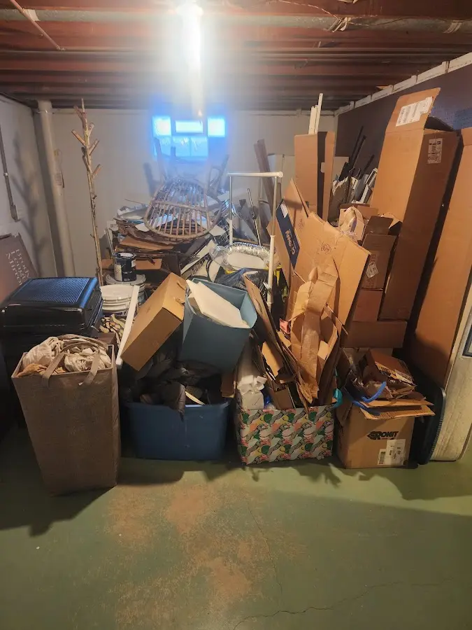 Roll-off dumpster container at job site for 2 Yard Dumpster Rental in Rowlett